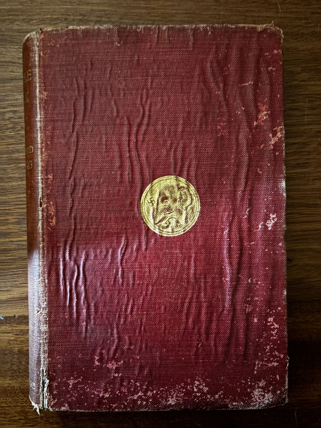 The Jungle Book — Rudyard Kipling (Macmillan, red cloth with gilt elephant medallion)